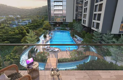 Swimming pool with adjoining lazy river seen from a residence balcony at ANP Privado